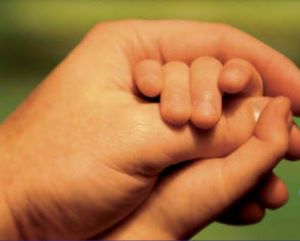 Image of parent and child hands